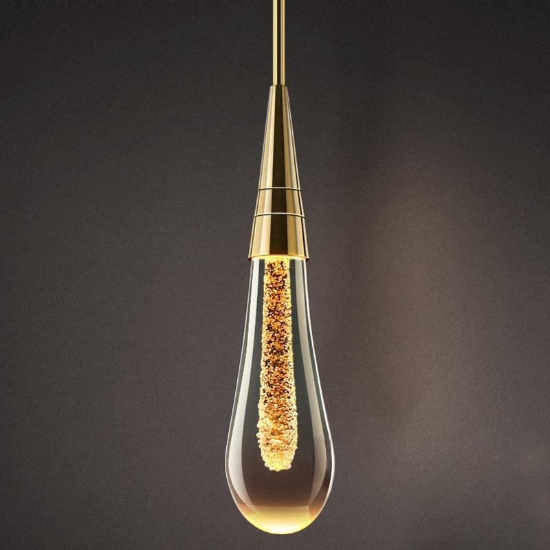 Suspension dorée en verre avec LED intégrée pour salle à manger salon cuisine moderne style scandinave | Koossa