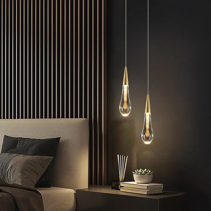 Suspension dorée en verre avec LED intégrée pour salle à manger salon cuisine moderne style scandinave | Koossa