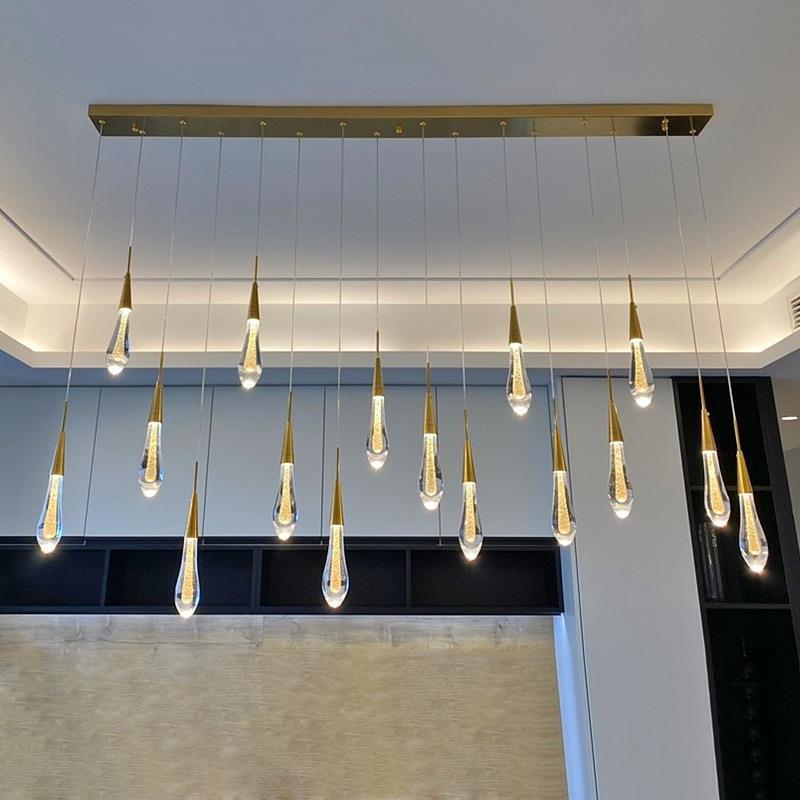 Suspension dorée en verre avec LED intégrée pour salle à manger salon cuisine moderne style scandinave | Koossa
