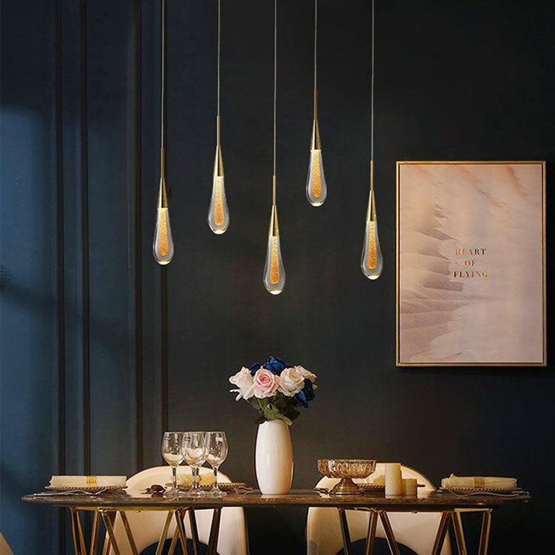 Suspension dorée en verre avec LED intégrée pour salle à manger salon cuisine moderne style scandinave | Koossa
