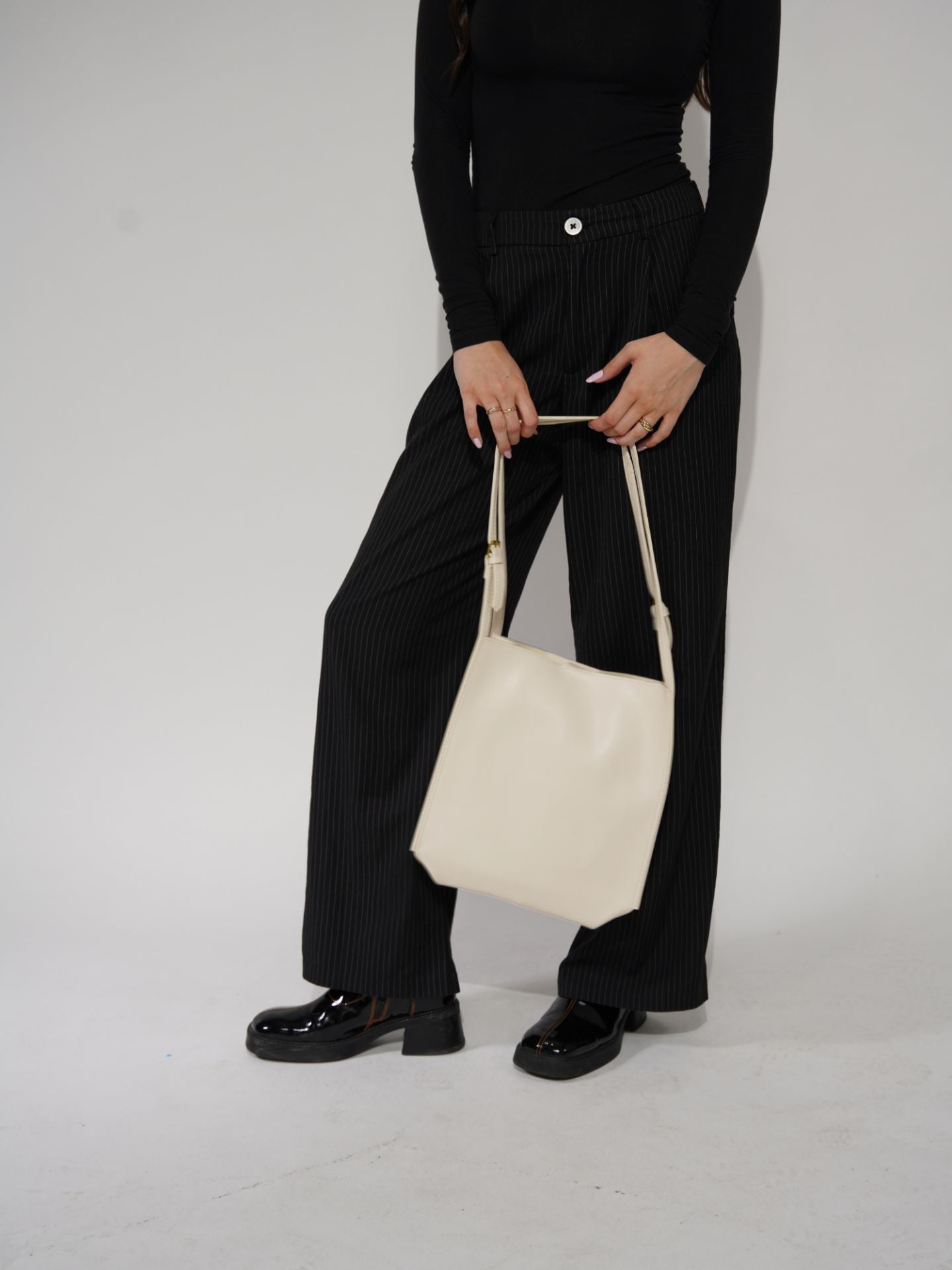 Structured Leather Shoulder Bag with Adjustable Strap and Secure Divider | Koossa