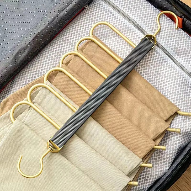 Cintre porte-pantalons pivotant en aluminium doré pour 6 pantalons avec barres antidérapantes gain de place | Koossa