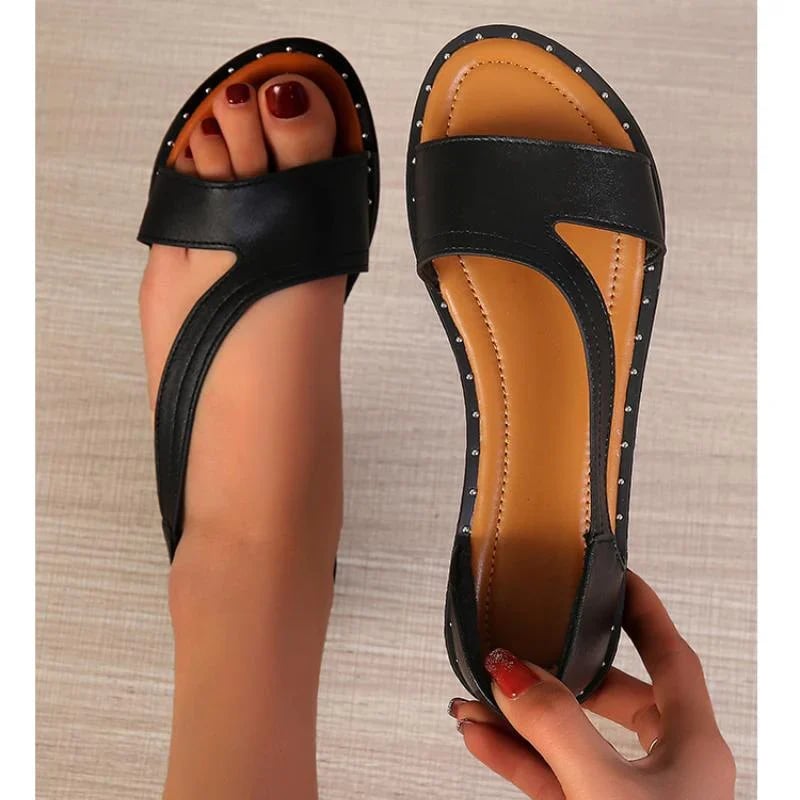 Women's Slip-On Flat Sandals with Cross-Strap Detail in Black and White for Effortless Summer Style | Koossa