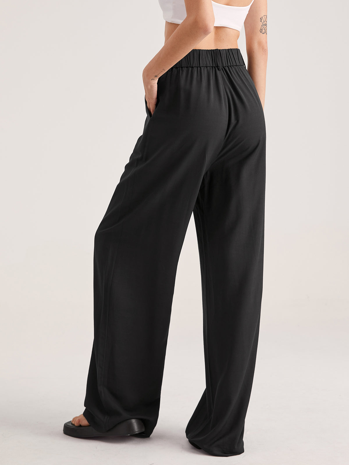 High-Waisted Wide-Leg Trousers in Lightweight Fabric for Smart Casual Elegance | Flowing Palazzo Trousers with Pleated Detail for Women | Koossa