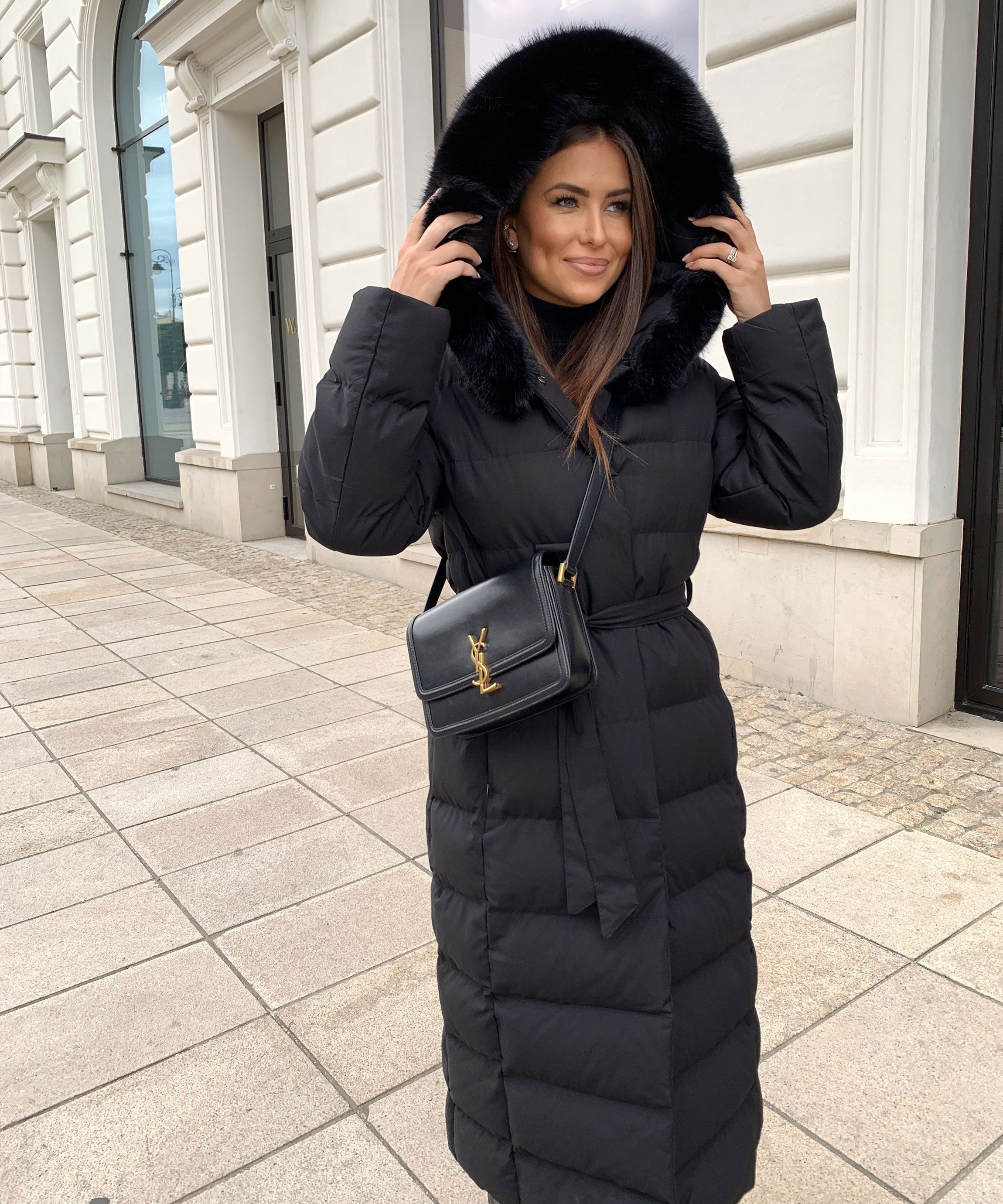 Women's Black Long Maxi Puffer Coat with Faux Fur Hood — Elegant Winter Jacket for Cold Weather & City Wear | Koossa