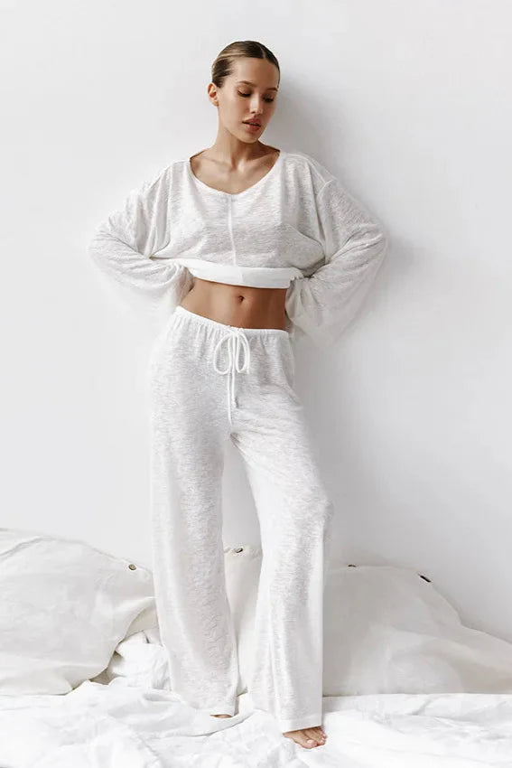Two-Piece Loungewear Set in Soft Cotton Blend White Wide-Leg Trousers Cropped Long Sleeve Top Relaxed Comfortable Coordinating Separates Elastic Waistband Drawstring Women's Lounge Set | Koossa