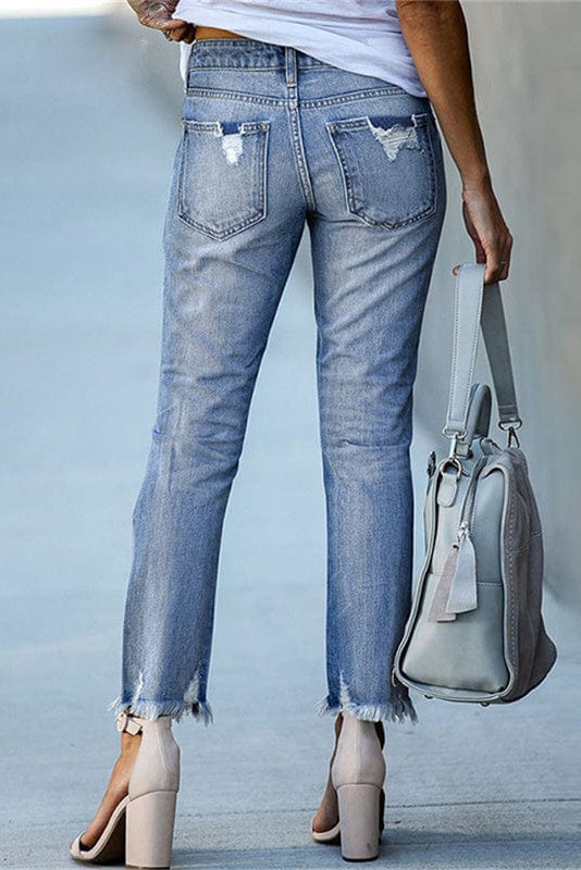 Straight Leg Jeans with Distressed Detail and Raw Hem in Light Blue | Timeless Denim Classic Casual Weekend Wear Five Pocket Design | Koossa