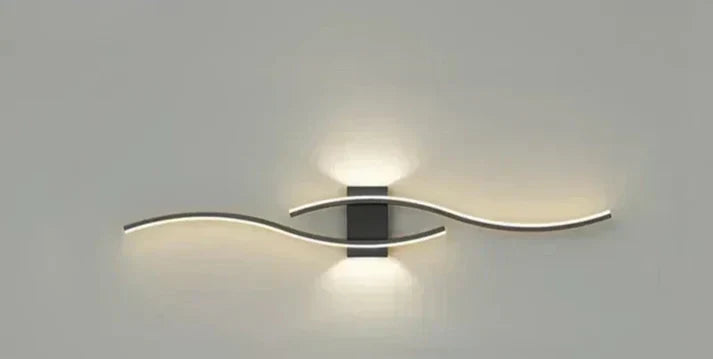 Curved LED Wall Sconce with Flowing Design – Warm White Light for Bedroom, Living Room, Hallway – Modern Metal Fixture | Lonoma