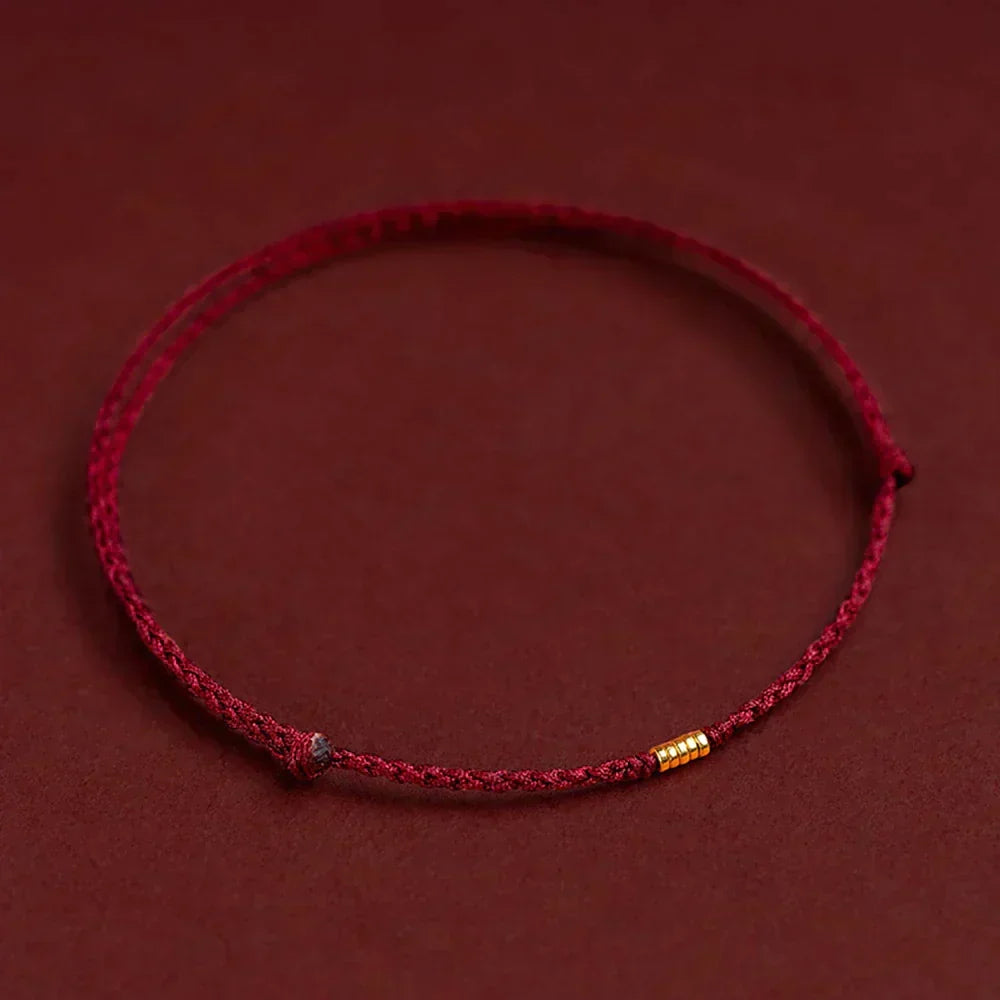 Bracelet tressé en cordon avec perles dorées – Symbole de protection et d'énergie positive pour femme réglable | Koossa