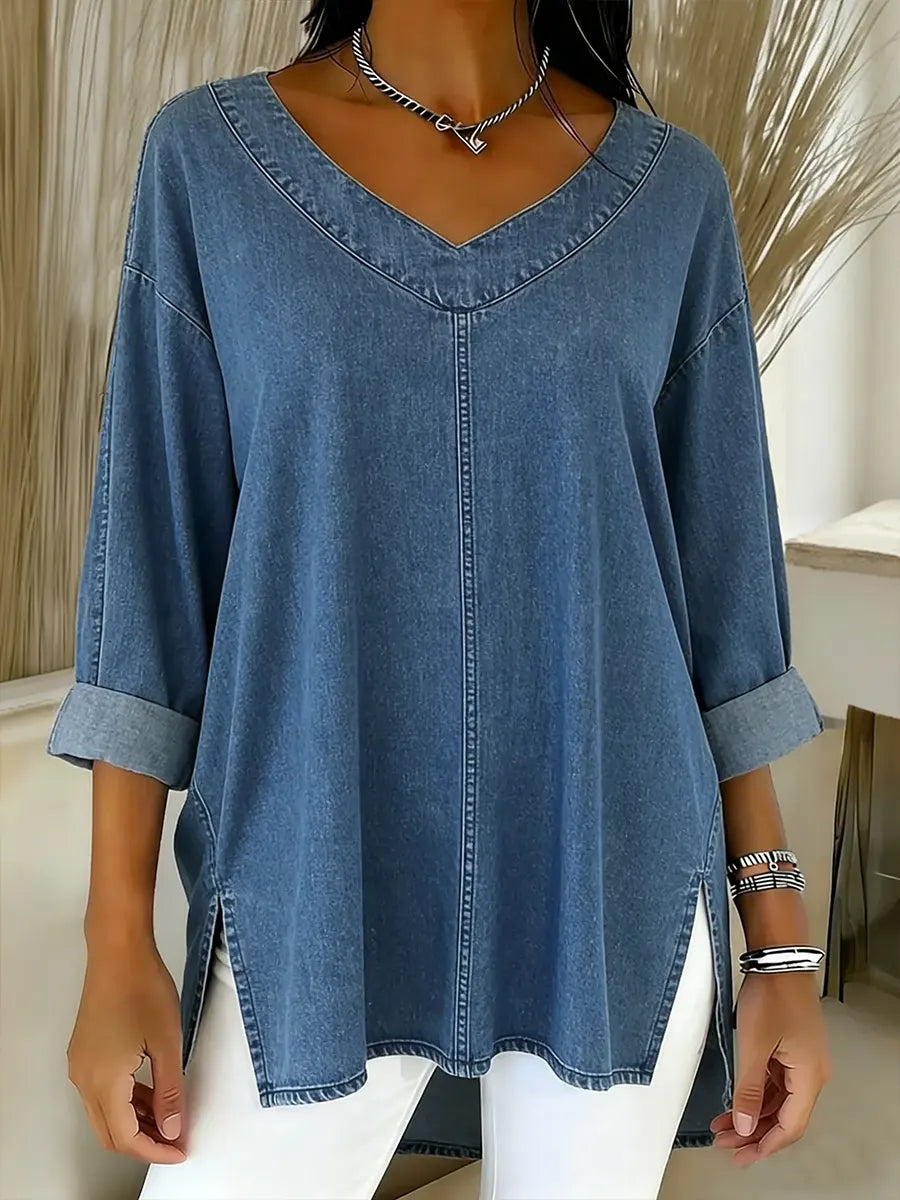 Women's Relaxed V-Neck Denim Shirt in Blue with Dipped Hem and Side Slits for Casual Elegance | Koossa