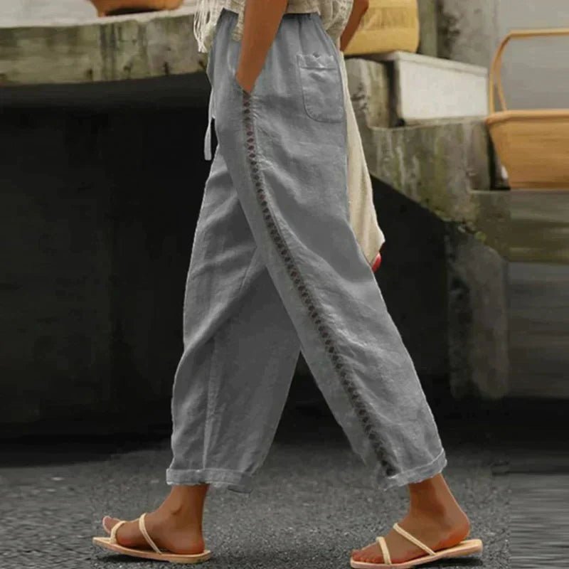Women's High-Waisted Tapered Trousers with Decorative Side Buttons in Linen-Look Fabric | Koossa