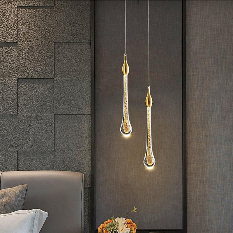 Suspension dorée en verre avec LED intégrée pour salle à manger salon cuisine moderne style scandinave | Koossa