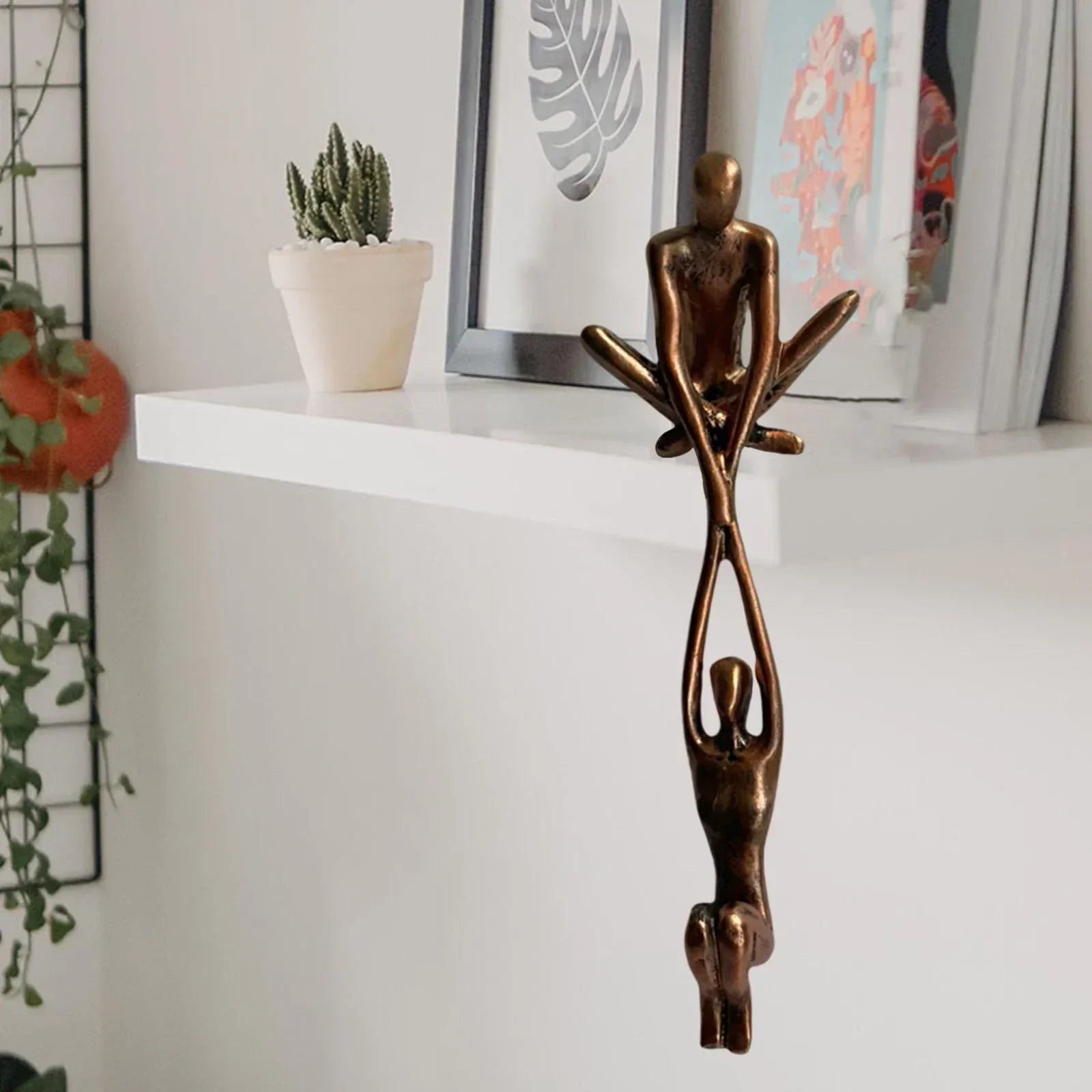 Sculpture Couple en Équilibre Résine Noir Bronze Décor Amour Harmonie Salon Bureau Design Moderne Élégant | Koossa