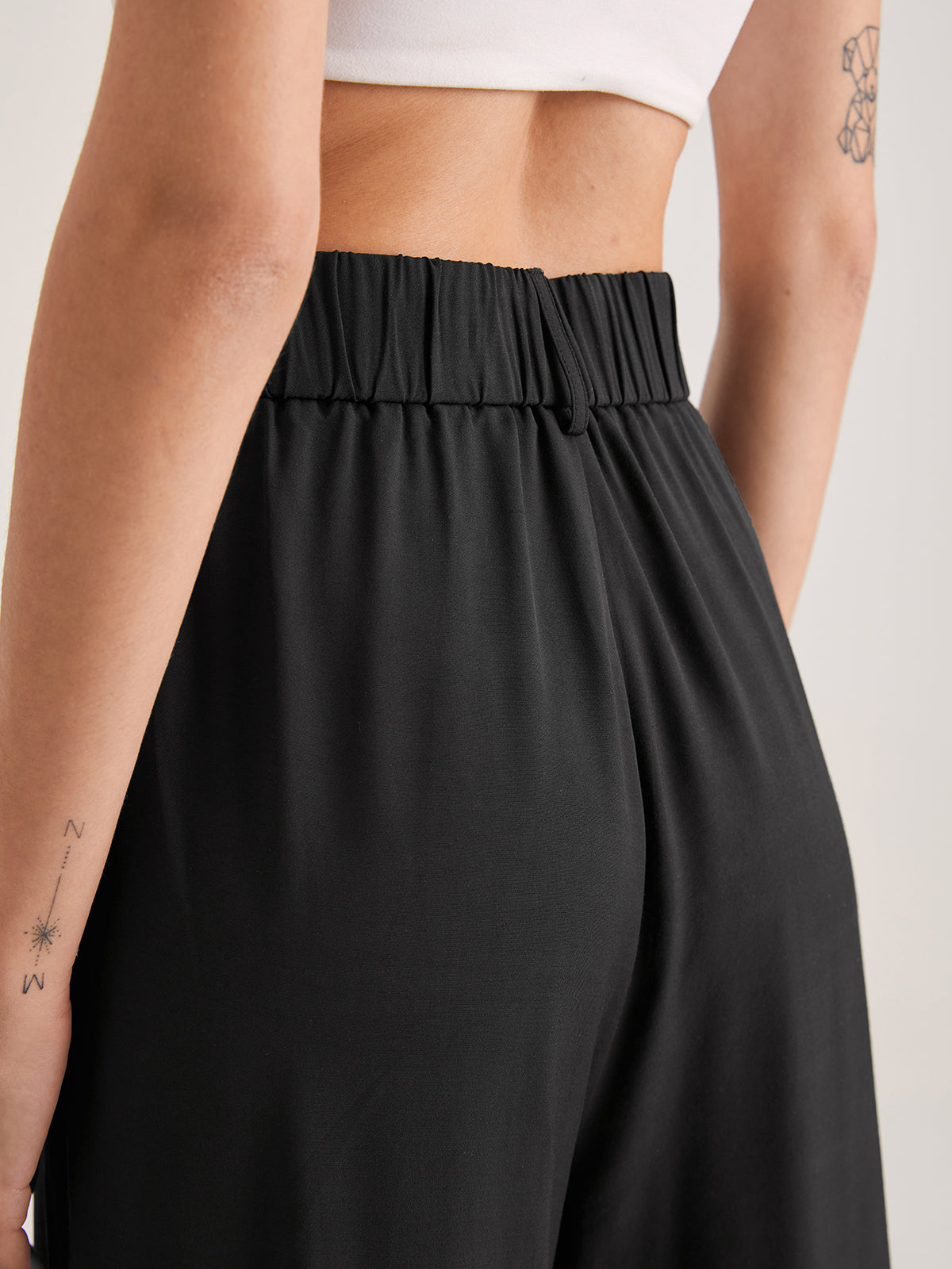 High-Waisted Wide-Leg Trousers in Lightweight Fabric for Smart Casual Elegance | Flowing Palazzo Trousers with Pleated Detail for Women | Koossa