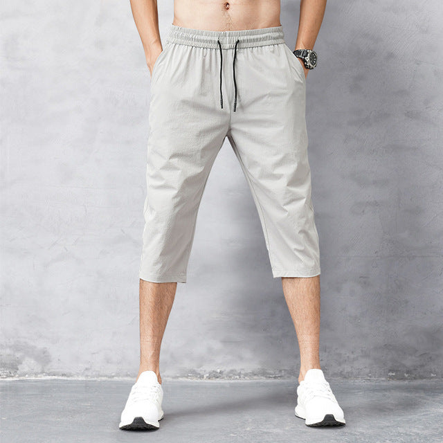 Men's Cropped Training Trousers in Grey and Black – Relaxed Fit Tapered Athleisure Joggers for Active Gentlemen | Koossa