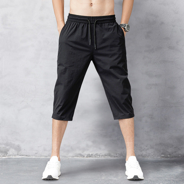 Men's Cropped Training Trousers in Grey and Black – Relaxed Fit Tapered Athleisure Joggers for Active Gentlemen | Koossa