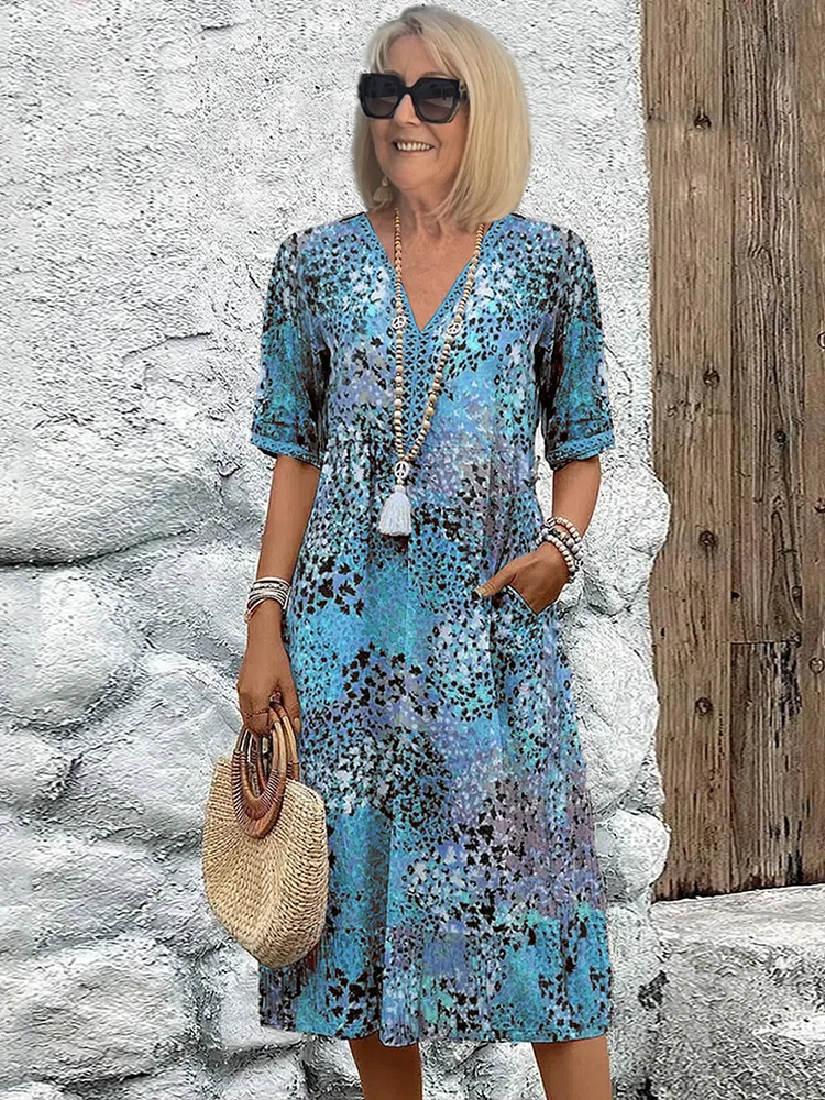 Vibrant Patterned Midi Dress in Flowing Silhouette for Women | Elegant Statement Dress with Graceful Movement and Bold Character | Koossa