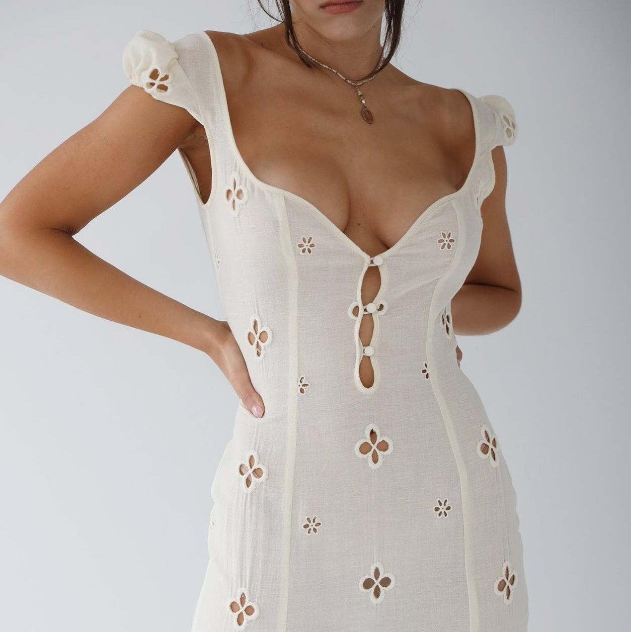 Mermaid Silhouette Wedding Gown in White with Floral Cutout Details – Fitted Bridal Dress for Special Occasions | Koossa