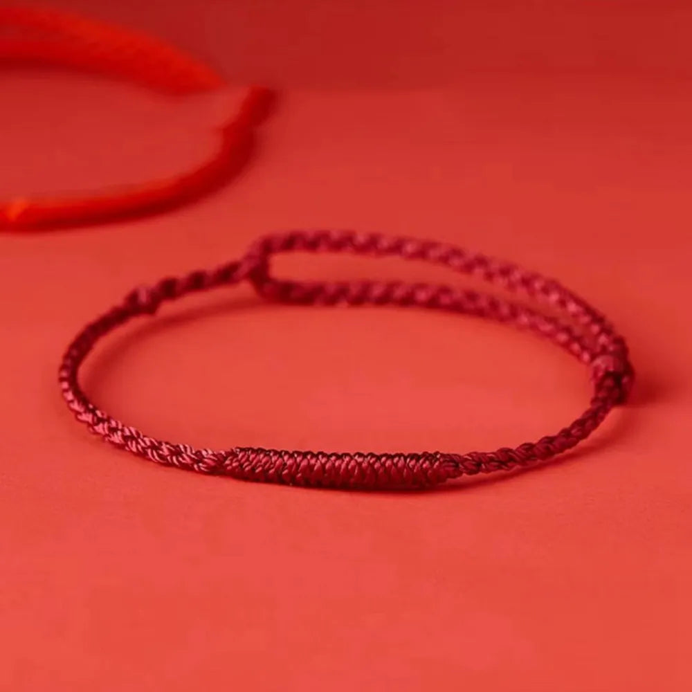 Bracelet tressé en cordon avec perles dorées – Symbole de protection et d'énergie positive pour femme réglable | Koossa