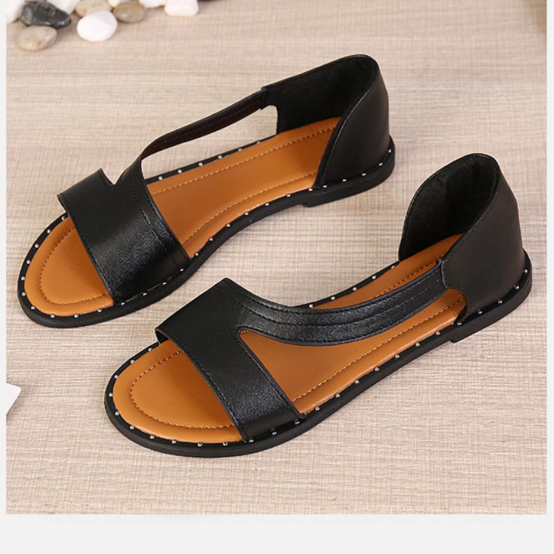 Women's Slip-On Flat Sandals with Cross-Strap Detail in Black and White for Effortless Summer Style | Koossa