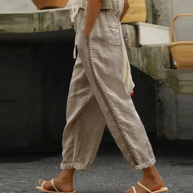 Women's High-Waisted Tapered Trousers with Decorative Side Buttons in Linen-Look Fabric | Koossa